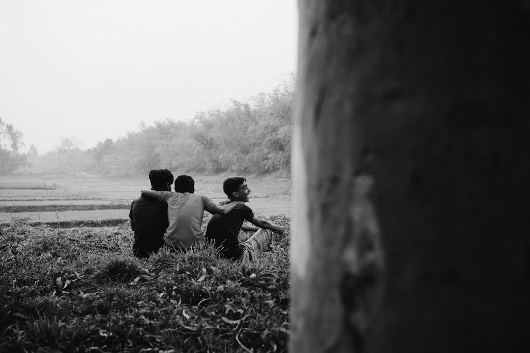 documentary photographer interviewing locals