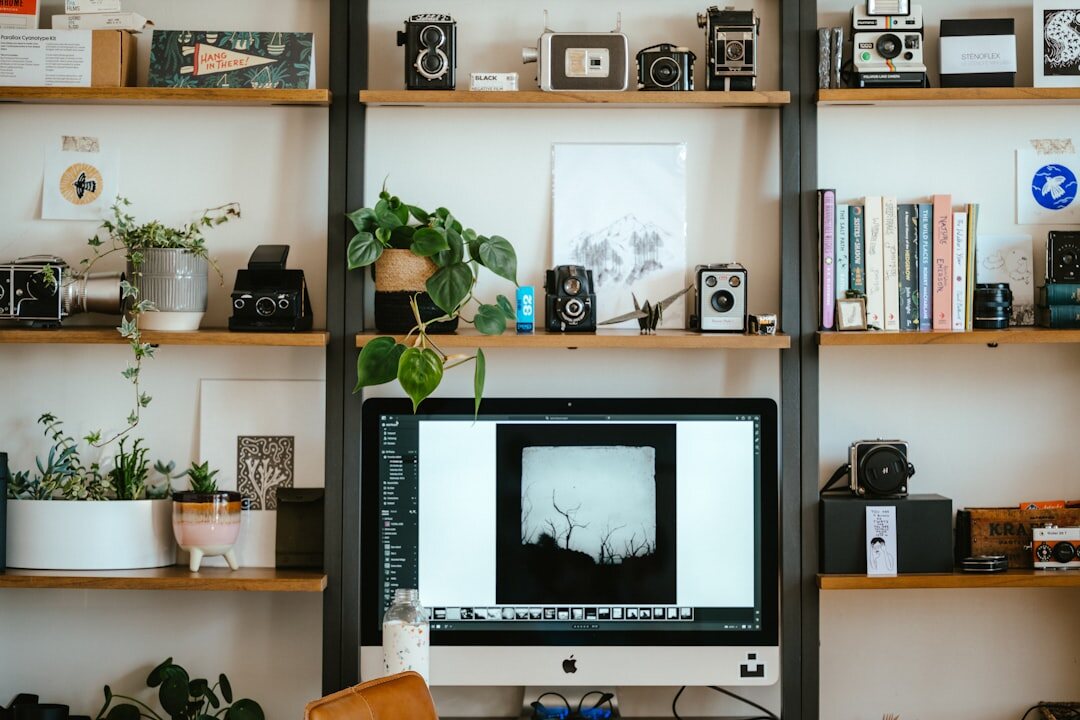 Photographer editing documentary photos at a desk