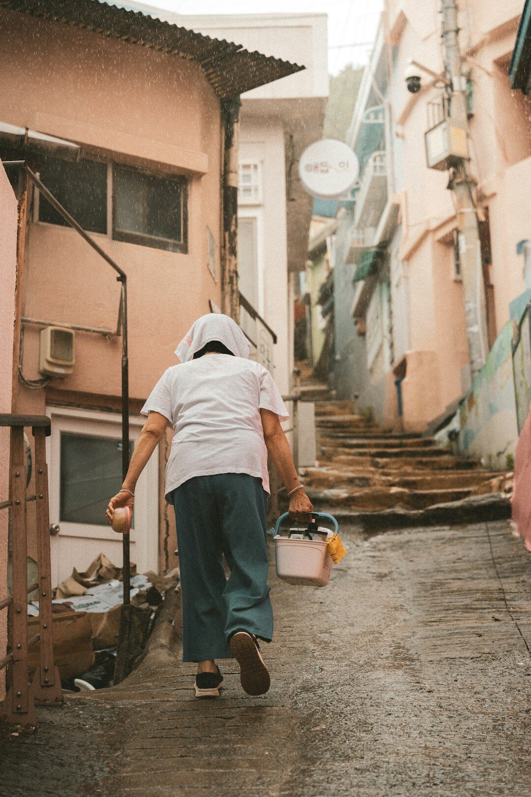 elderly woman in village street