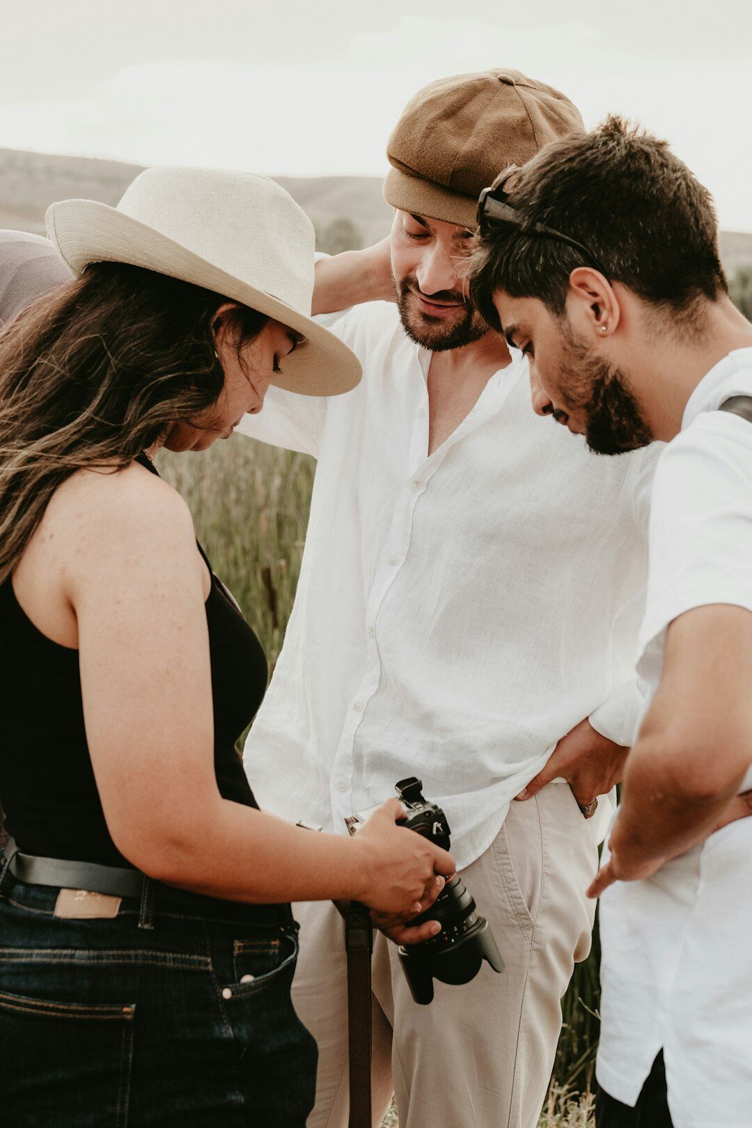 Group of photographers reviewing contact sheets together
